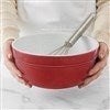 Red Bowl in Hands with Whisk